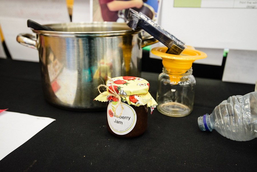 a table with the tools needed to make jam