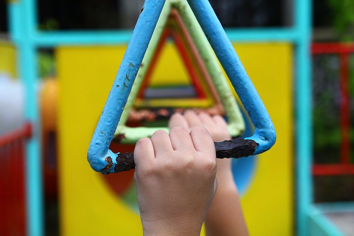 close up of monkey bar handles